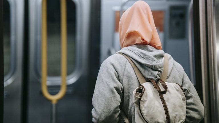 Woman with backpack in subway