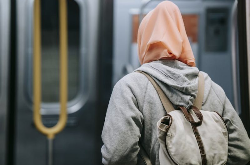 Woman with backpack in subway