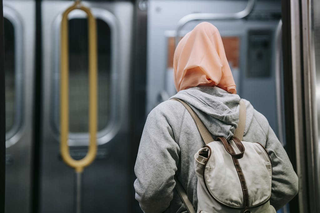 Woman with backpack in subway
